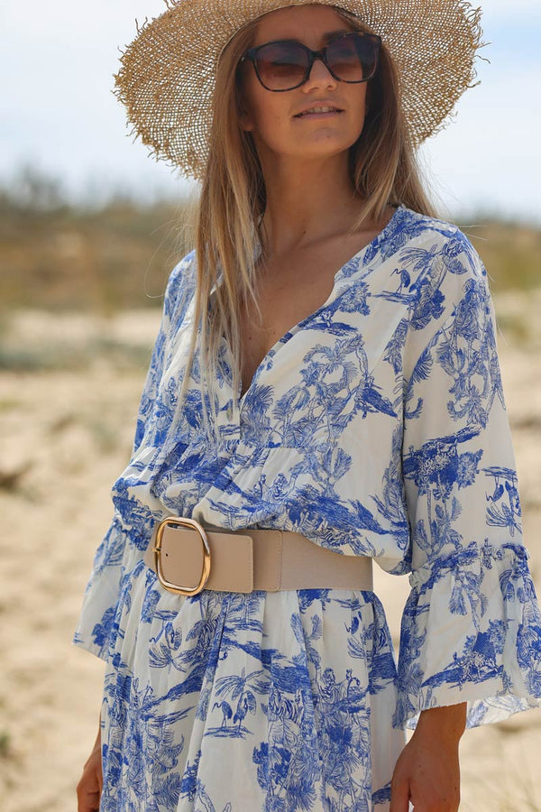 Model wearing Tiered maxi dress with toile de jouy royal blue print