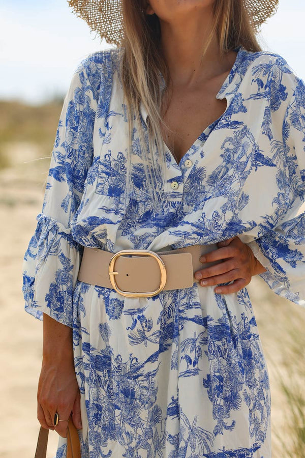 Model wearing Tiered maxi dress with toile de jouy royal blue print