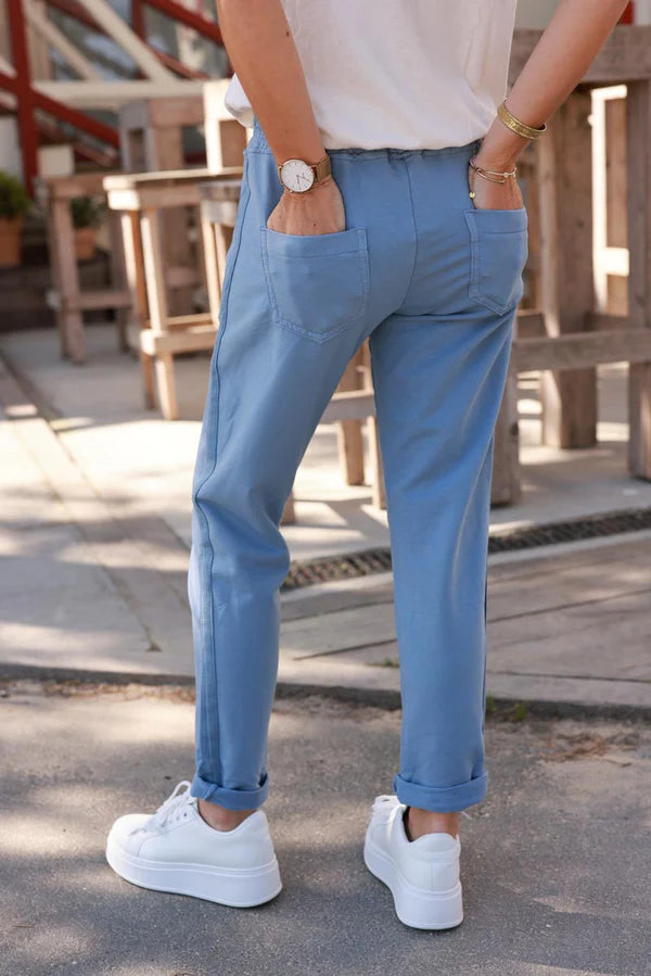Blue stretch sweatpants with ribbon outseam zipped pockets