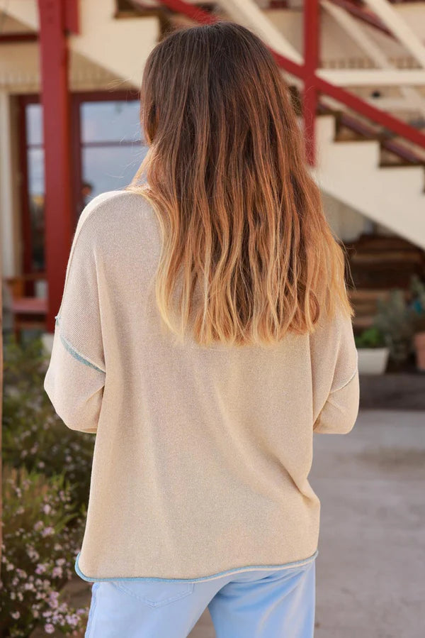 Gold V-Neck Knit Top with Baby Blue Inverted Seams