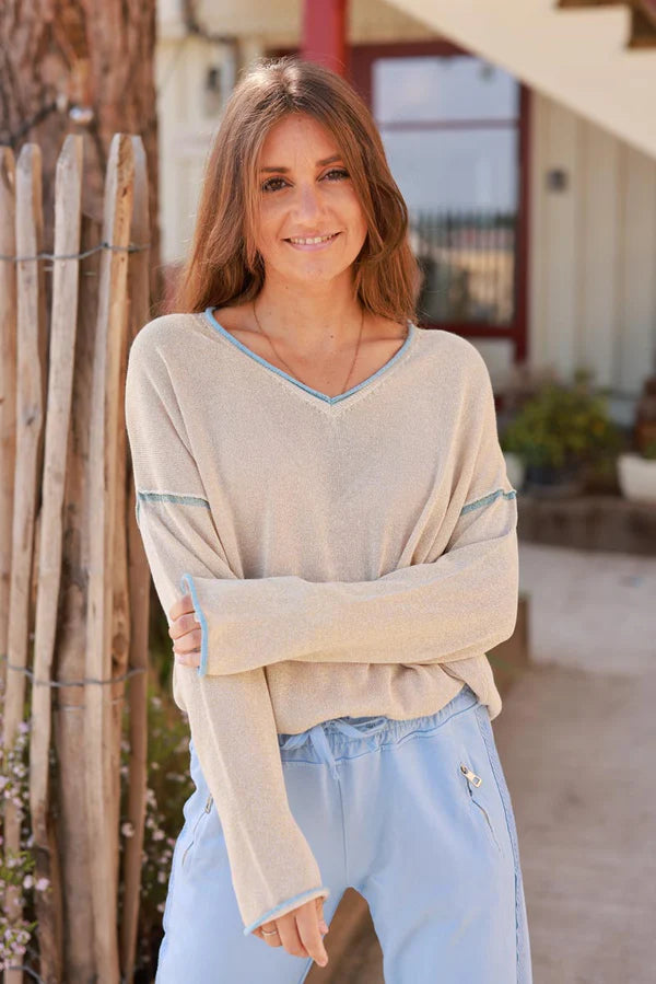 Gold V-Neck Knit Top with Baby Blue Inverted Seams