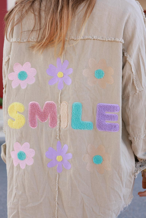 Light Beige denim jacket with 'smile' and flower embroidery