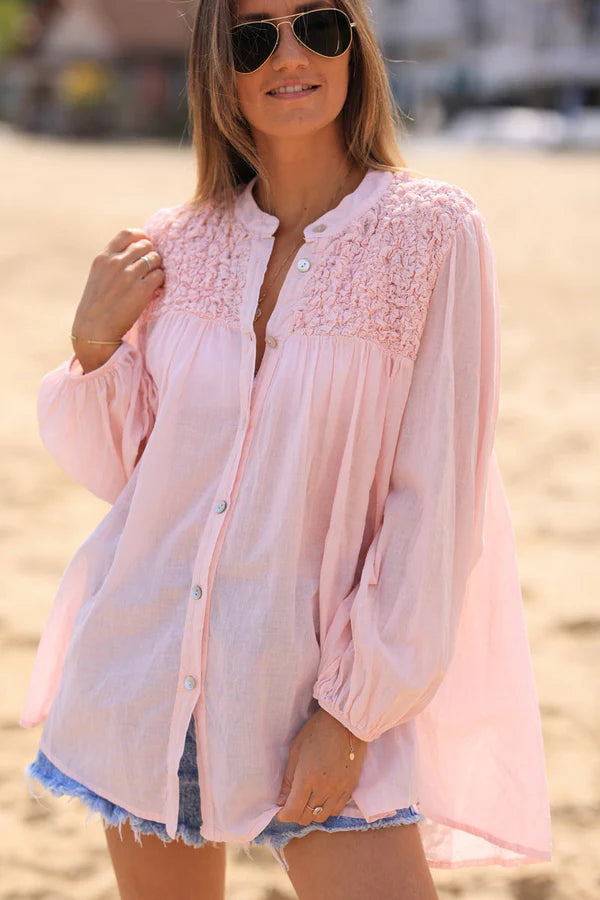 Smocked soft pink floaty blouse with mother of pearl buttons