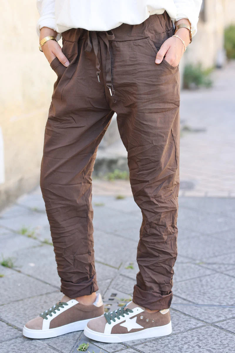 Brown chocolate comfort and stretch fabric pants with a glitter star