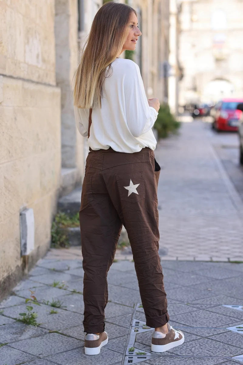 Brown chocolate comfort and stretch fabric pants with a glitter star