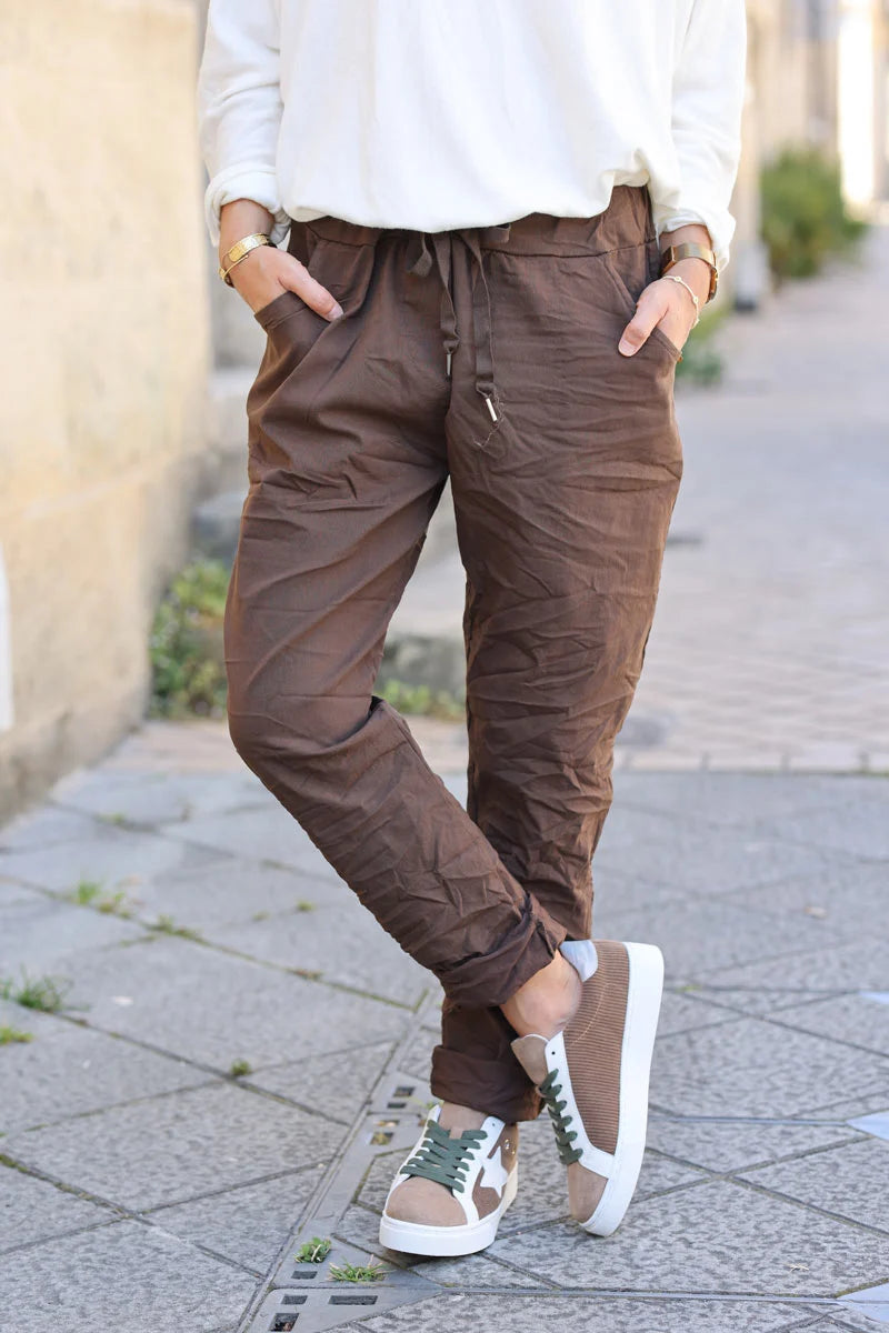 Brown chocolate comfort and stretch fabric pants with a glitter star