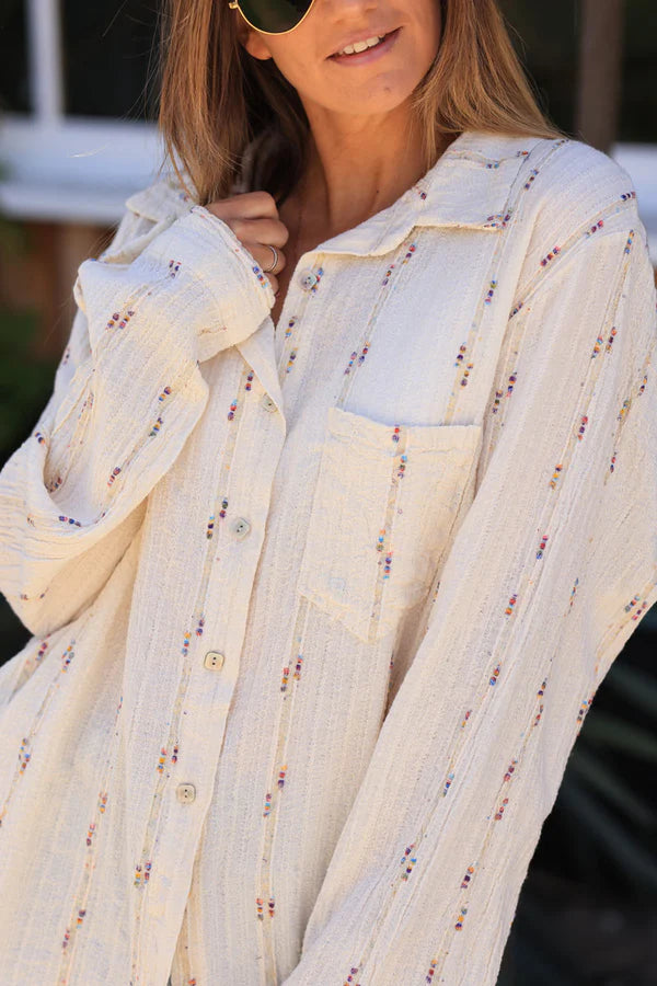 Beige shirt with coloured and gold metallic threads