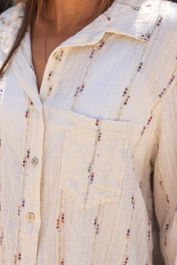 Beige shirt with coloured and gold metallic threads