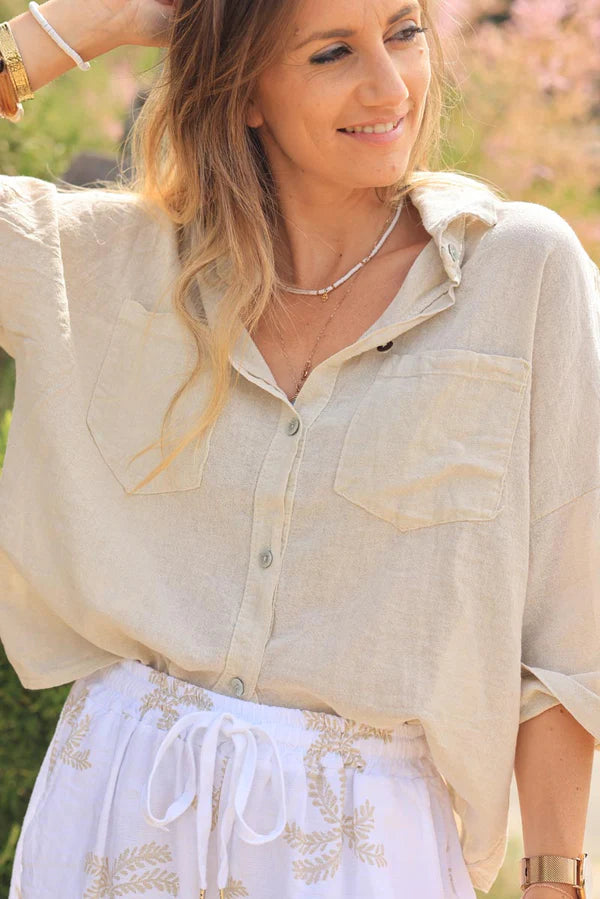 Beige soft cotton blouse with 3/4 sleeves and large pockets