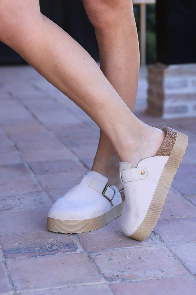 Beige suedette slip on flatform mules with buckle