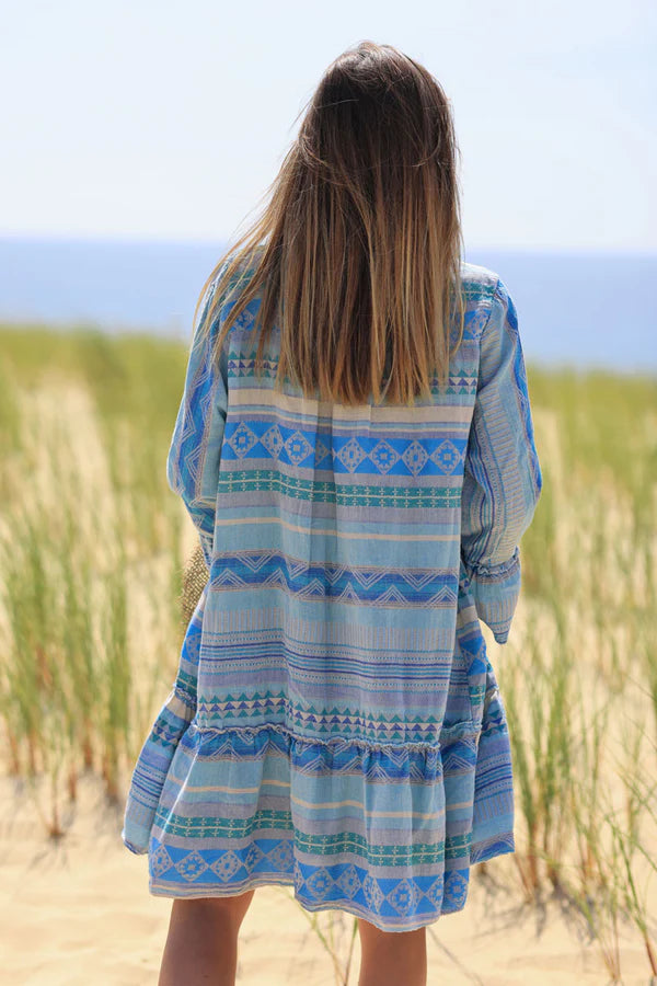 Blue frilled cotton dress with woven aztec print