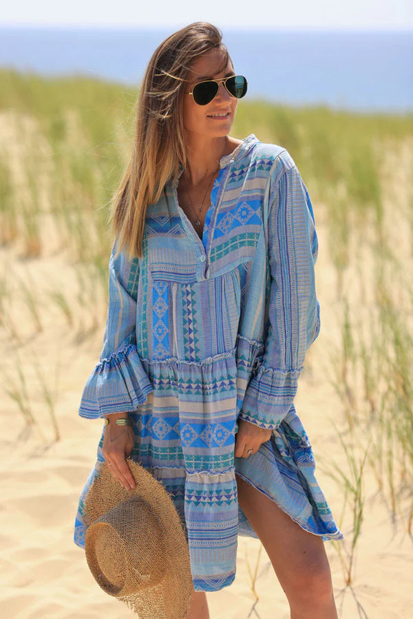 Blue frilled cotton dress with woven aztec print