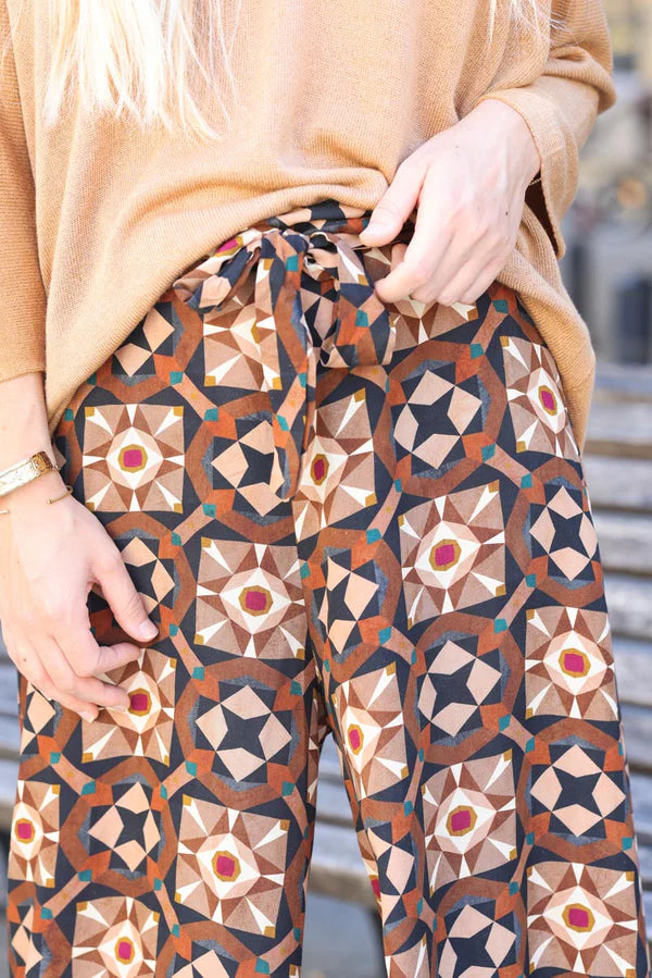 Floaty black rosette print pants