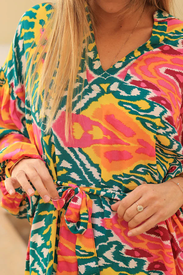 Multicoloured blouse with glitch kaleidescope print and fabric belt