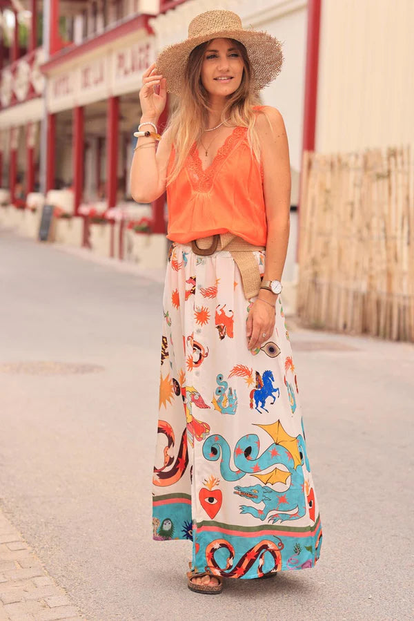 Off white floaty skirt with slit and colorful symbols zodiac signs print