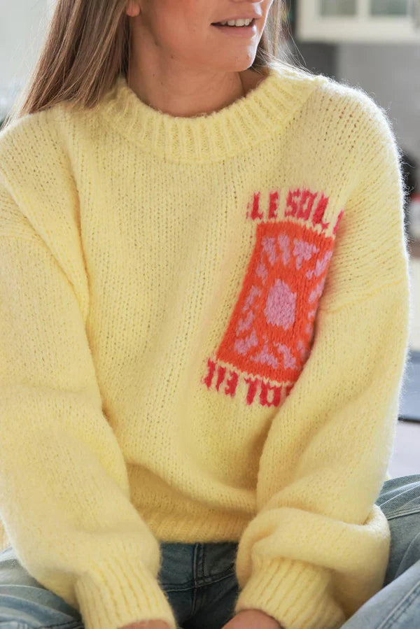 Pastel Yellow Chunky Knit Sweater with Vibrant Sun Embroidery