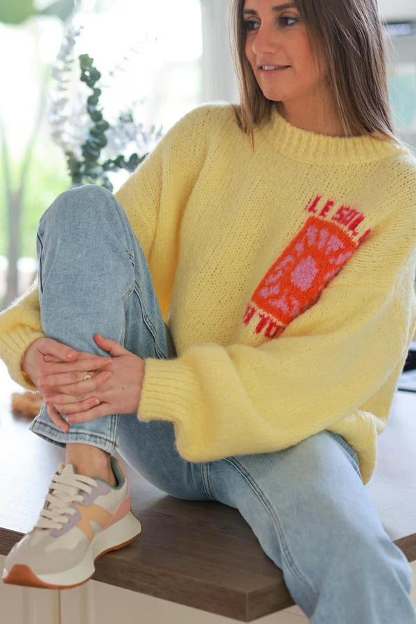 Pastel Yellow Chunky Knit Sweater with Vibrant Sun Embroidery