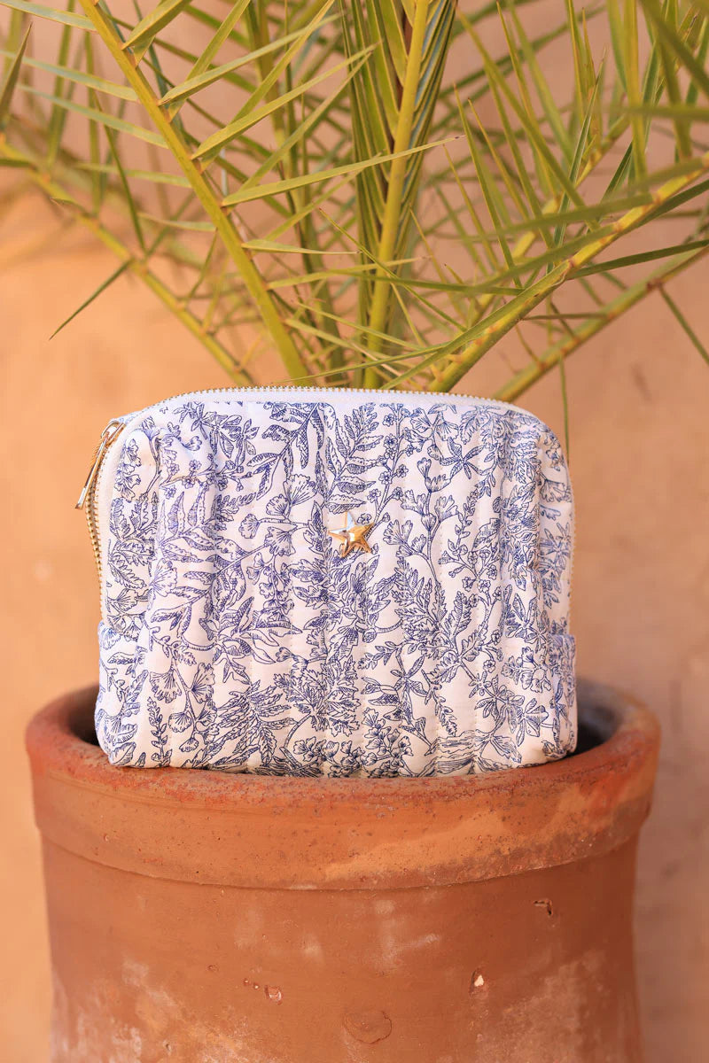 Small quilted cotton pouch bag in a blue toile de jouy pattern