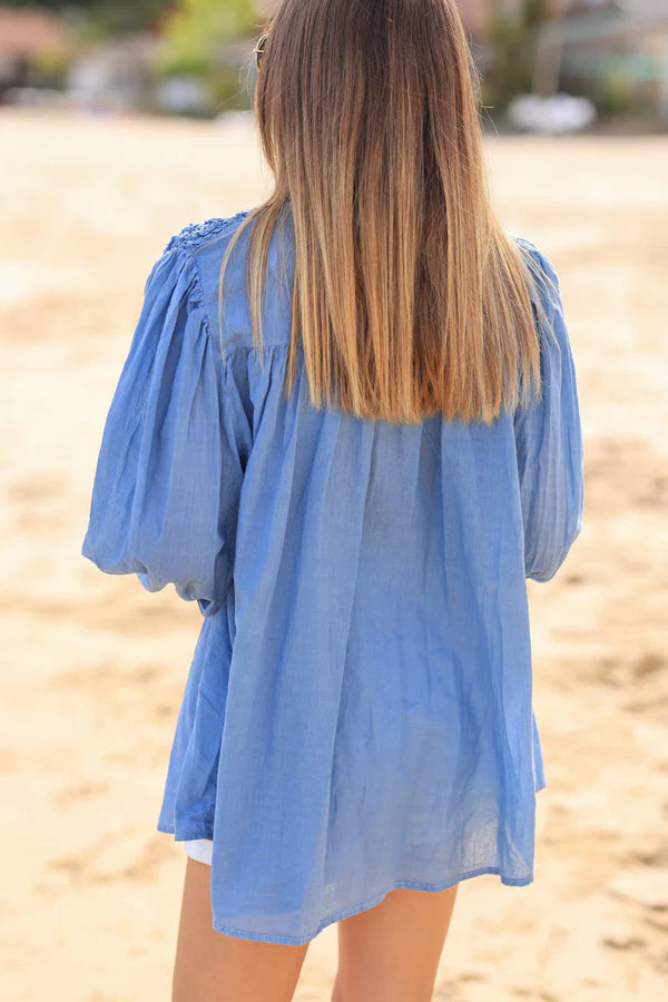 Smocked dusty blue floaty blouse with mother of pearl buttons