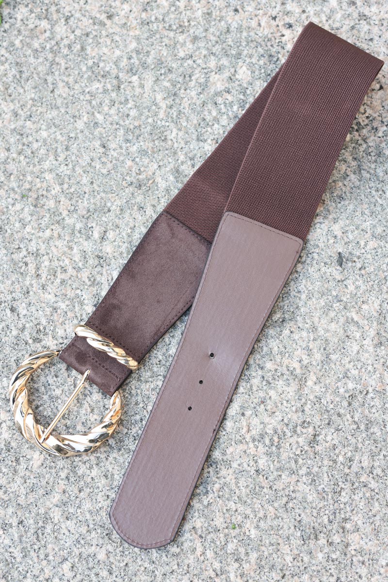 Wide brown elastic belt with large twisted gold buckle