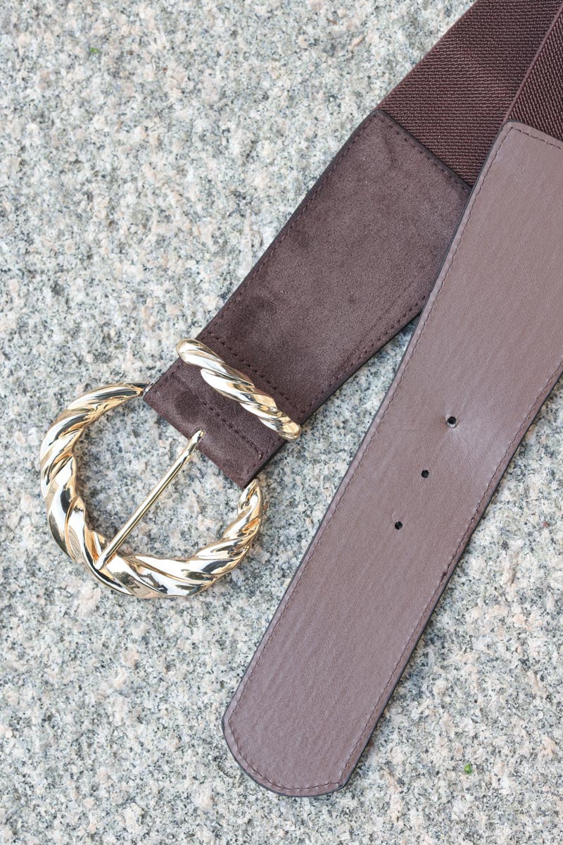 Wide brown elastic belt with large twisted gold buckle